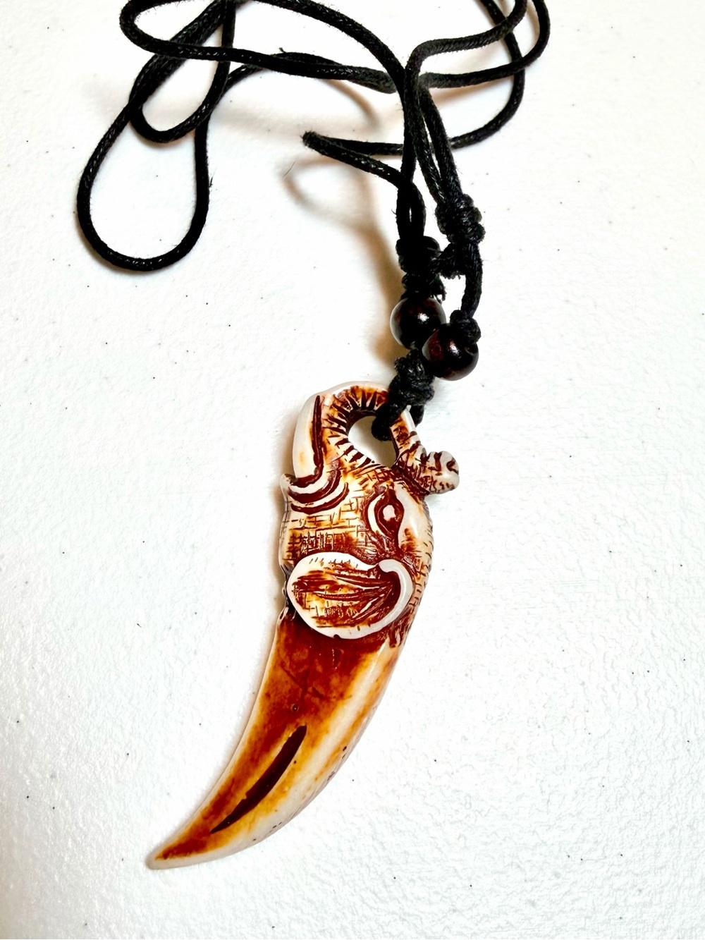 Men's Carved Brown Tusk Pendant Necklace with Black Cord